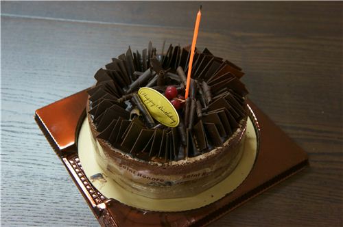 The cake was so full of chocolate that it was really hard to cut it