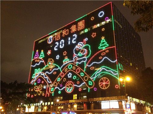 There are so many lights thta it is almost hard to find Santa Claus in this picture