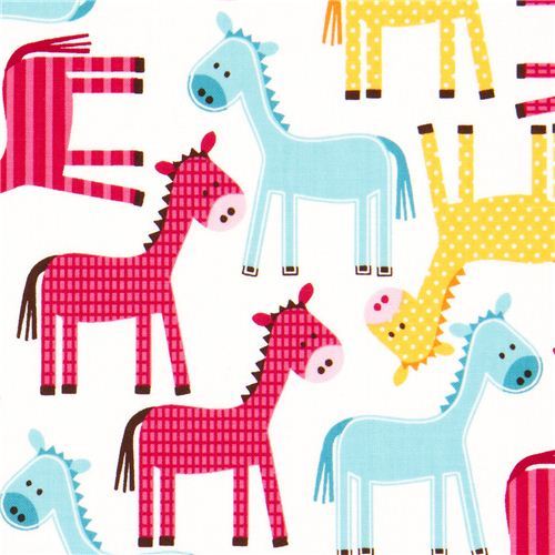 white fabric with dotted horses by Robert Kaufman USA
