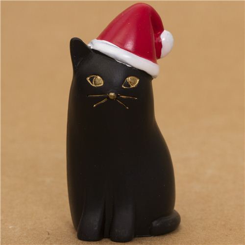 cute black cat with red Santa Claus hat from Japan