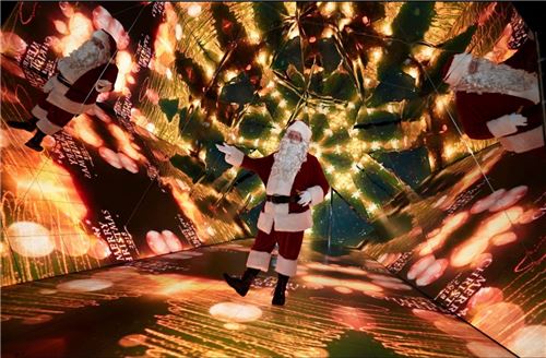 Santa trying out the kaleidoscope!