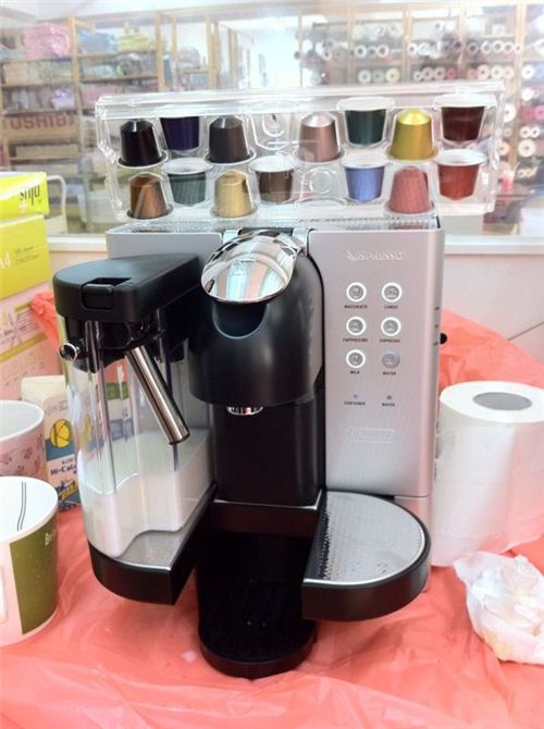 Our powerful little caffeine dispenser: A Nespresso coffee machine