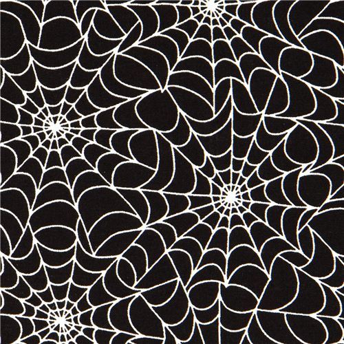 black designer fabric with glow in the dark spiderwebs