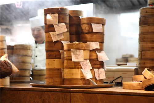 We had a good view of the busy kitchen with hundreds of steamer baskets