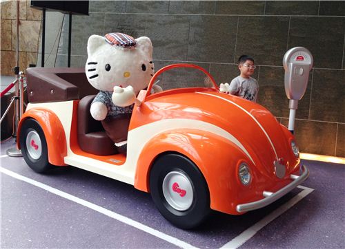 Dear Daniel in a classic car from the 1960s