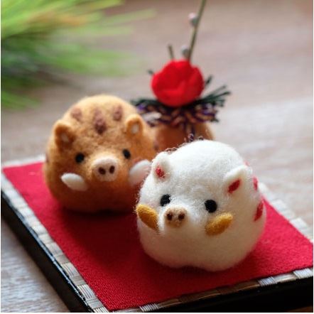 Awesome little felt boars!