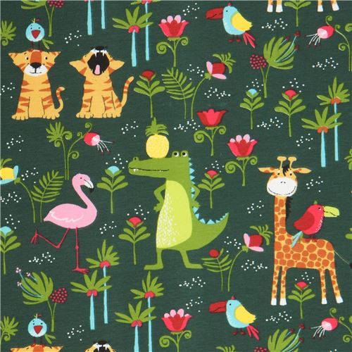 colorful animal knit fabric by Stof France in dark green