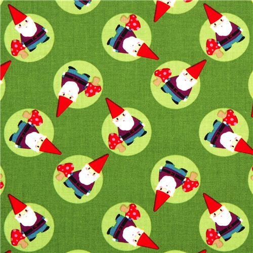 green designer fabric with tossed gnomes and mushrooms
