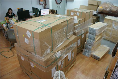 Two of the three pallets full of fabrics from the USA