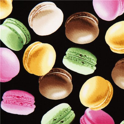 black fabric with french macaroons