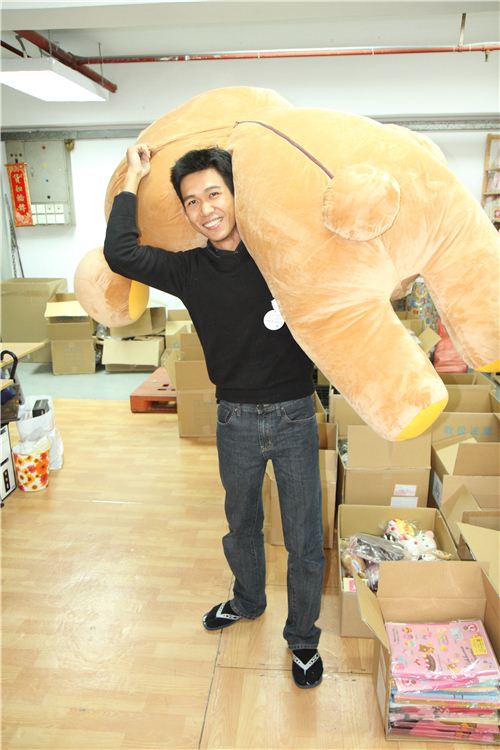 Alan is fooling around with cute Rilakkuma