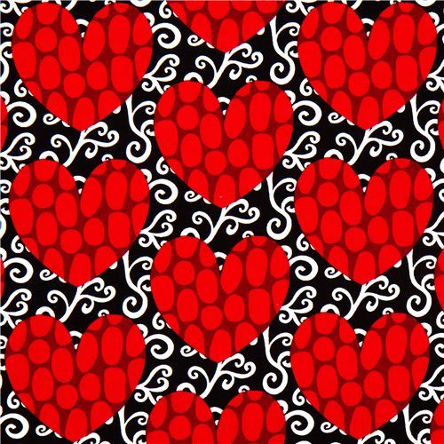 black fabric with red hearts by Robert Kaufman