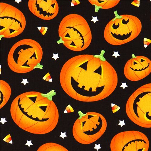 black Halloween designer fabric with orange pumpkins