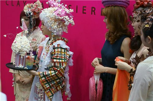 A fashion show by students who made cute candy outfits