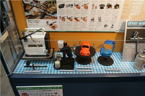 Not everything was girly, boys and men loved this miniature car section 