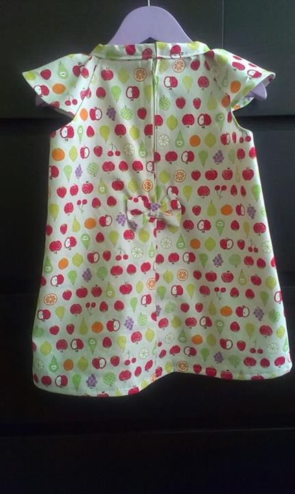 Joanna Lef from Switzerland made this kawaii girl's dress with our Cosmo apple fabric