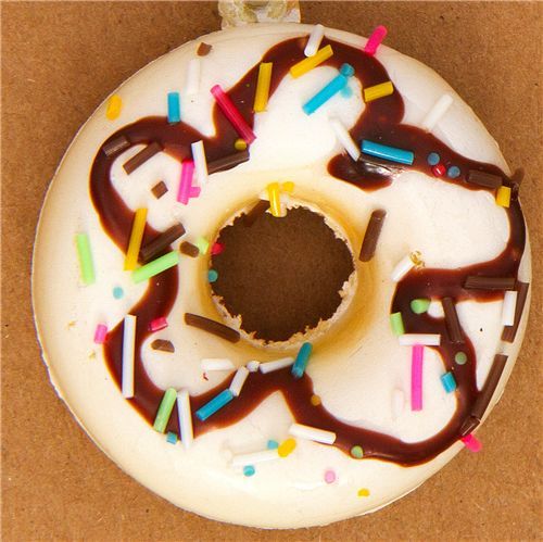 white donut squishy charm with chocolate sauce