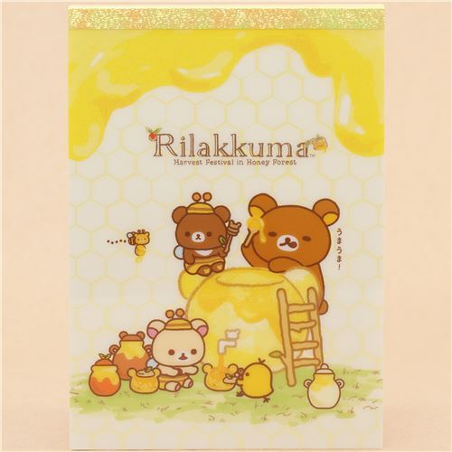 colorful San-X memo pad with Rilakkuma eating honey