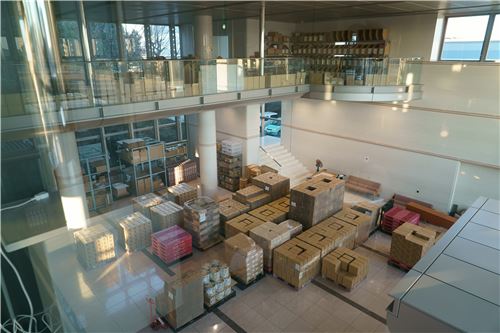An office space filled with big boxes of squishies!